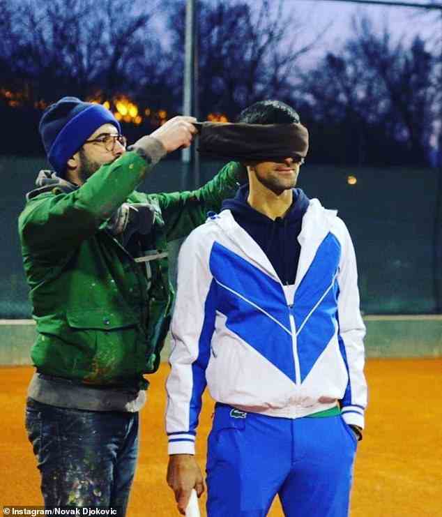 Among the snaps Novak recently shared on Instagram was a photograph as he took to the tennis court - while blindfolded