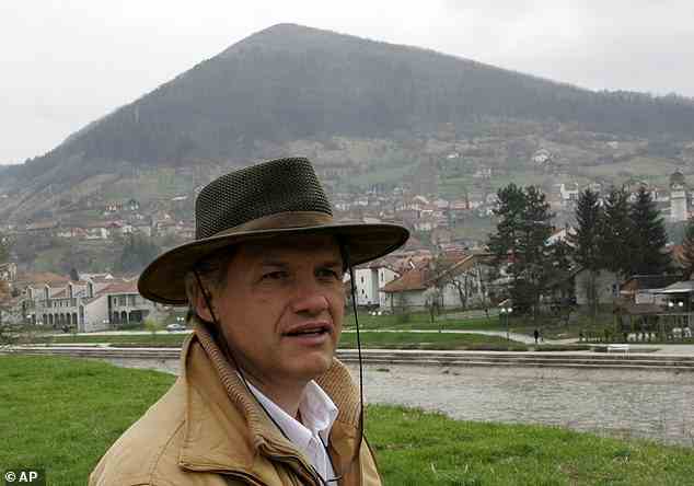 Djokovic thinks the 'Bosnian pyramids' near Sarajevo give off a mystical energy; here Semir Osmanagic, an archaeologist famous for his unorthodox theories on them, stands near one