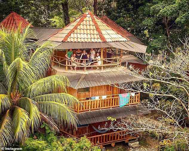 The 34-year-old would sit on chairs apart from the other guests who even thought she had left because they never saw her get home from her shifts at the resort (pictured, a file photo of the treehouses on the resort's website)
