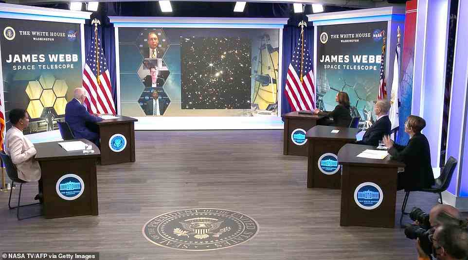 The James Webb was launched December 25 last year with the aim of looking back in time to the dawn of the universe and to capture what happened just a couple of hundred million years after the Big Bang. Pictured above are NASA administrators and President Biden, Vice President Kamala Harris