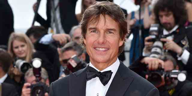 Tom Cruise nimmt an der Vorführung von teil "Top-Gun: Maverick" während der 75. jährlichen Filmfestspiele von Cannes im Palais des Festivals am 18. Mai 2022 in Cannes, Frankreich.  Seitdem hat der Film an den weltweiten Kinokassen mehr als 1 Milliarde US-Dollar eingespielt