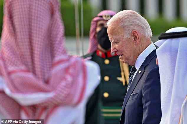 President Joe Biden speaks with Saudi officials on the tarmac of the King Abdulaziz International Airport in Jeddah