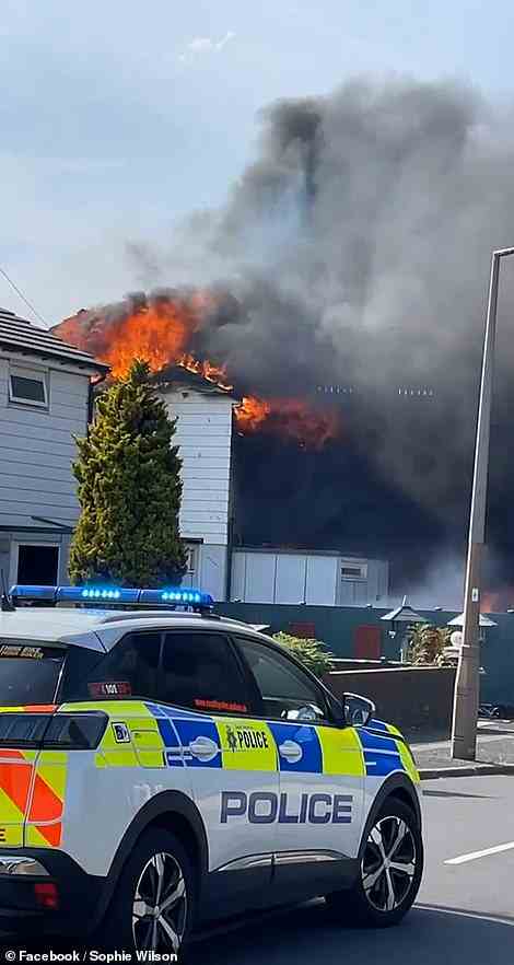 Police evacuated residents and closed roads to tackle the fire