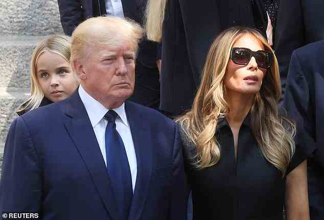 Donald and Melania Trump emerge from the funeral of his first wife Ivana on Wednesday, with Donald's eight-year-old granddaughter Chloe behind them