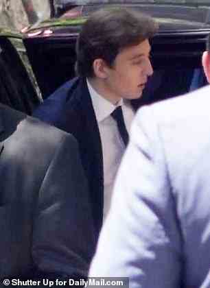 Barron is shown arriving at Ivana Trump's funeral on Wednesday