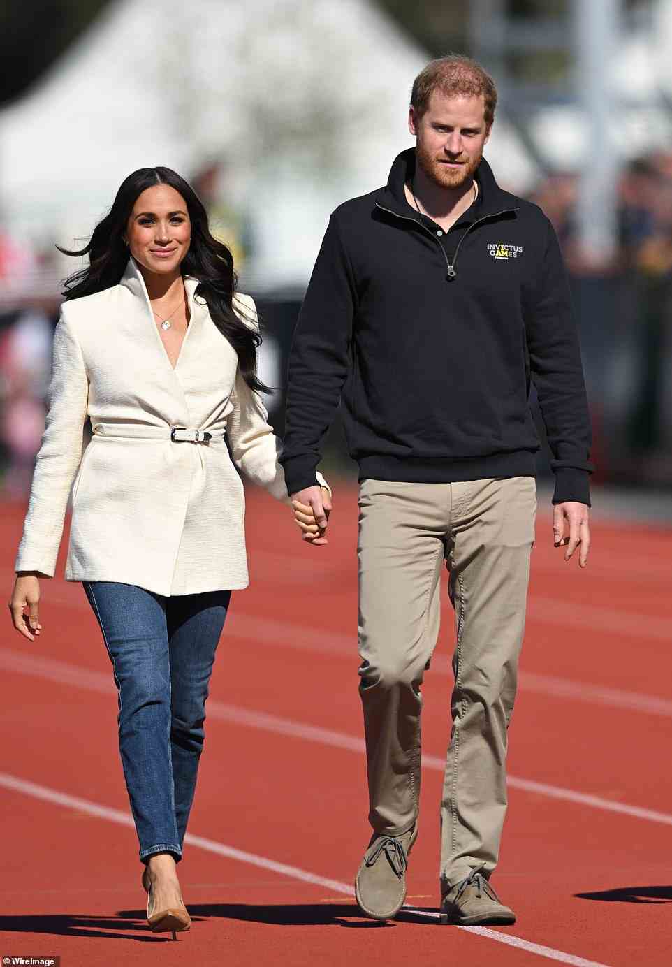Tom Bower, author of Revenge, claims the Duchess of Sussex 'reduced people to tears with her passive aggressive tone' and demanded first-class flights and luxury accommodation for business trips. Pictured, Meghan and Harry at the Invictus Games in April