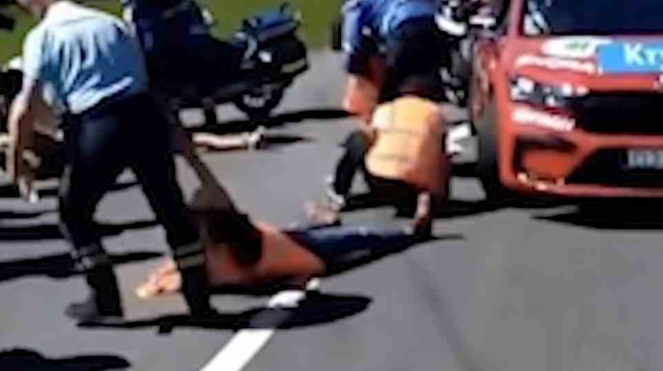Protestors at Tour de France were also videoed and pictured previously being removed in early July by Tour De France officials