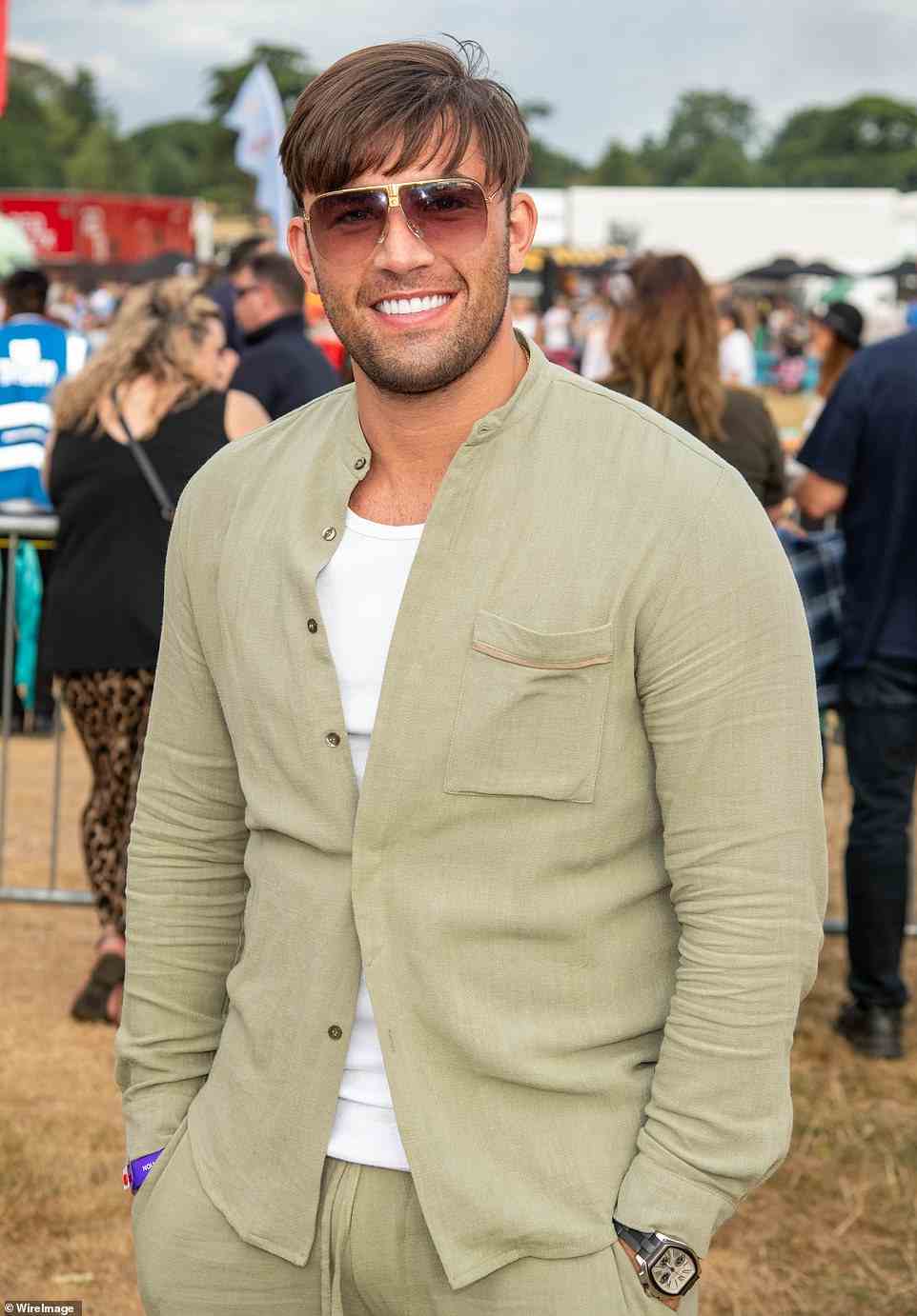 Don't mind me: But former Love Island winner Jack Fincham's flashy grin ensured he caught the eye on Monday