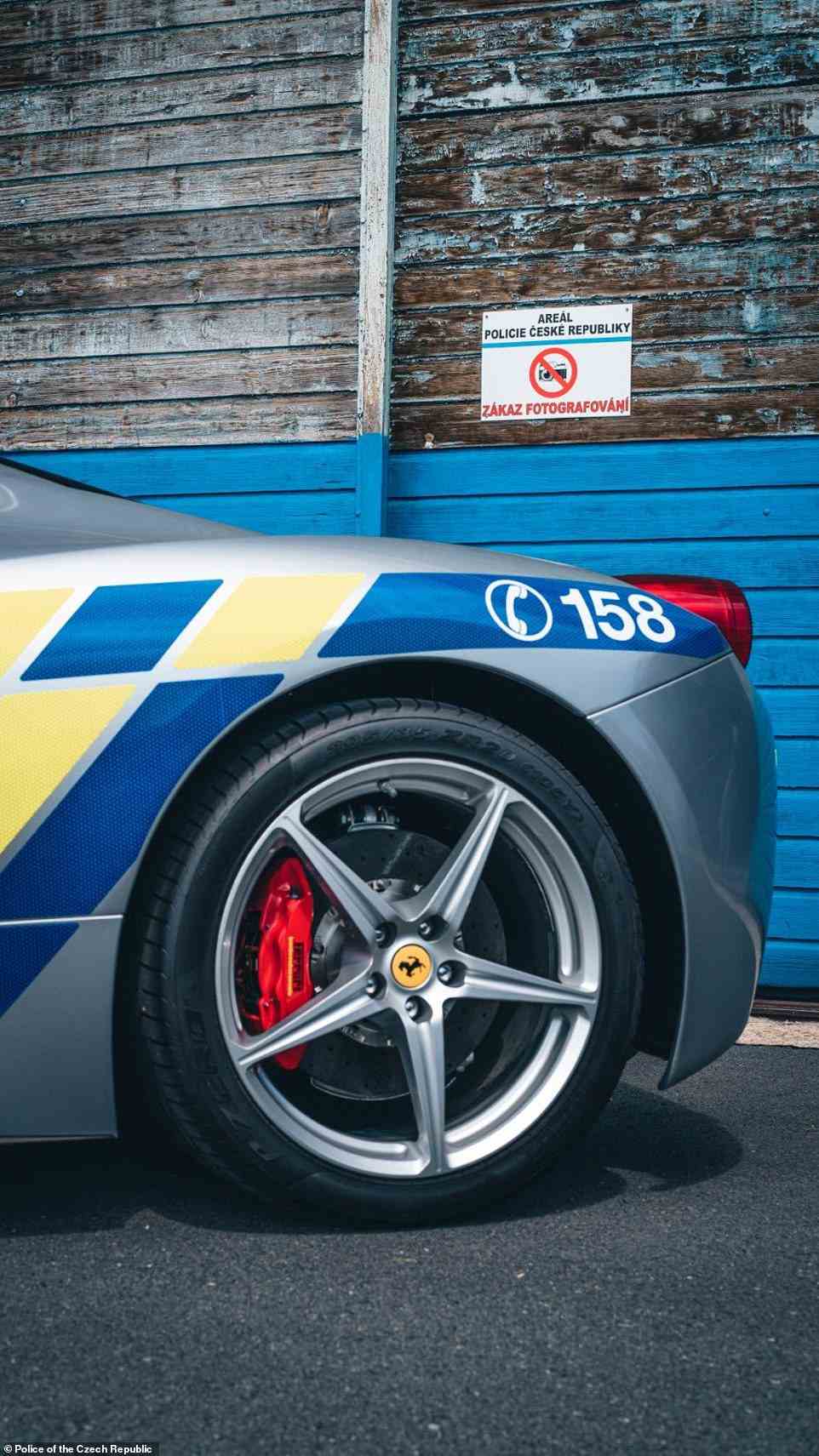 Originally painted traditional Ferrari red, the car had a complete police makeover, receiving a silver spray job before adding yellow and blue reflective stripes for the fully-authentic look