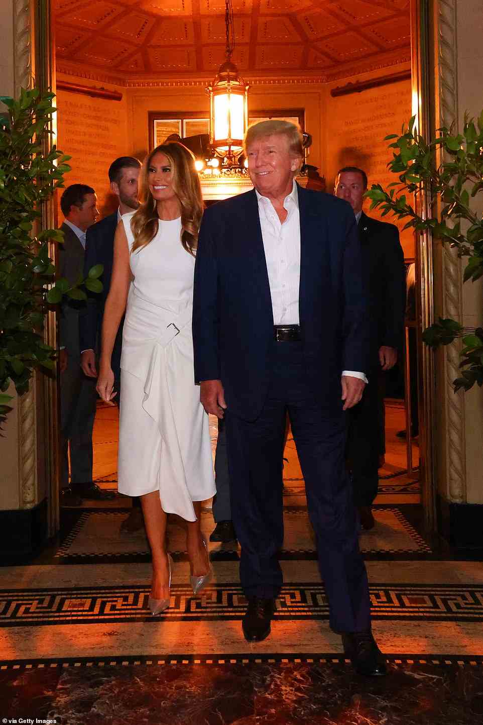 Trump and his wife Melania are seen on Wednesday night arriving at the welcome party in Manhattan