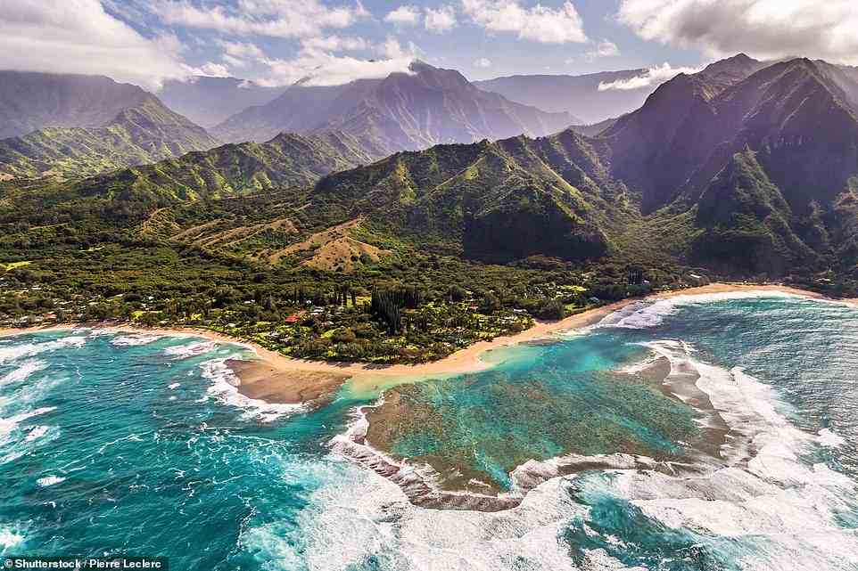 25. TUNNELS BEACH, KAUAI, HAWAII: This is billed as the 'ultimate snorkelling spot, with the picturesque backdrop of Mount Makana and lush jungles'. Big 7 Travel says: 'Lava tubes form the many underwater caverns here, which gives the beach its name.' It adds that the water can get rough during winter, so visitors should keep an eye on the tides