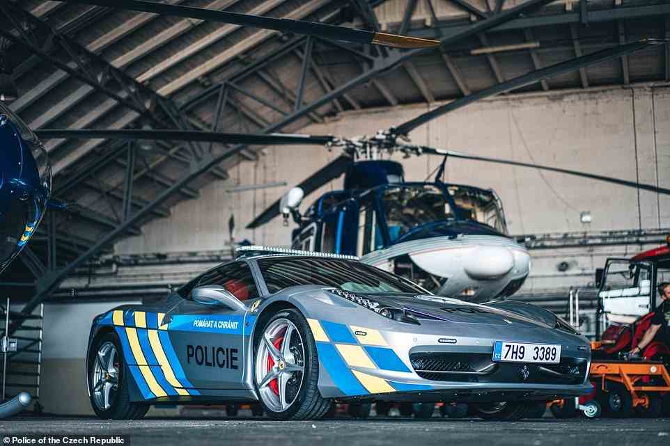 Good luck trying to outrun officers in this: Czech police have this week started using a new patrol car - it's a 202mph Ferrari 458 Italia that was recently confiscated from a criminal. The force has spent £10,300 turning it into their own pursuit vehicle