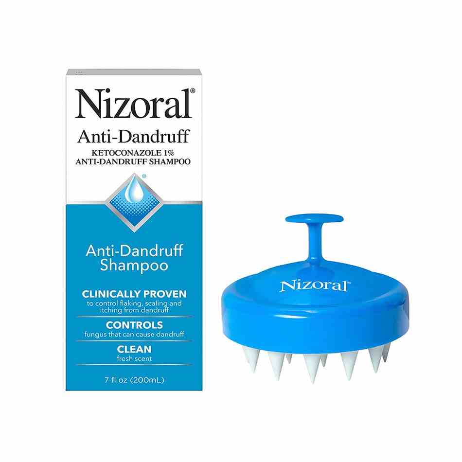 Nizoral Anti-Dandruff Shampoo and Scalp Massager Brush Bundle blau-weißes Kopfhautmassagegerät und eine Schachtel Shampoo auf weißem Hintergrund