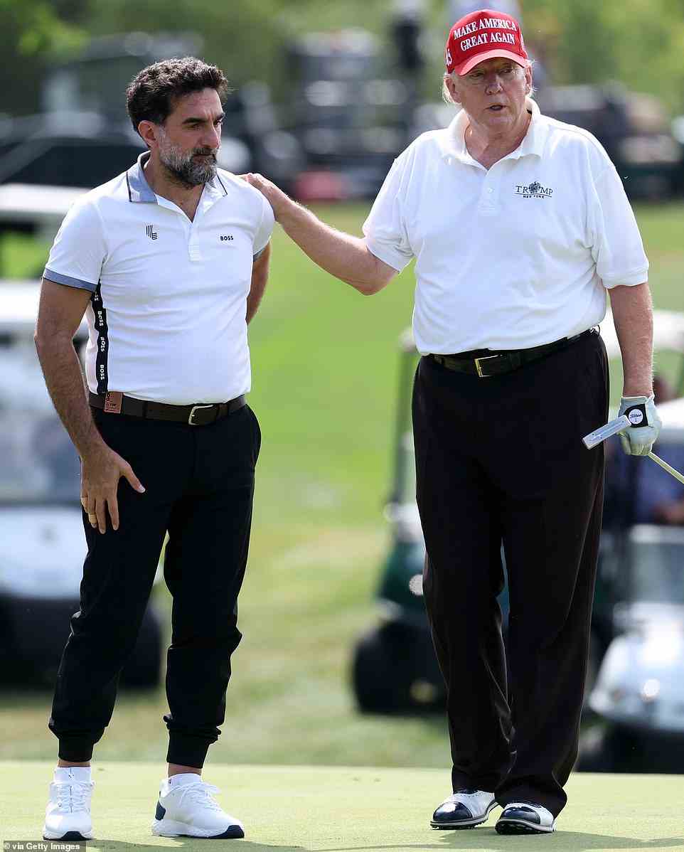 Trump is shown with his excellency Yasir Al Rumayyan, Prince Mohammed bin Salman's personal banker and Governor of the Saudi Public Investment Fund, at his golf course on Thursday amid a wave of criticism from the families of 9/11 victims