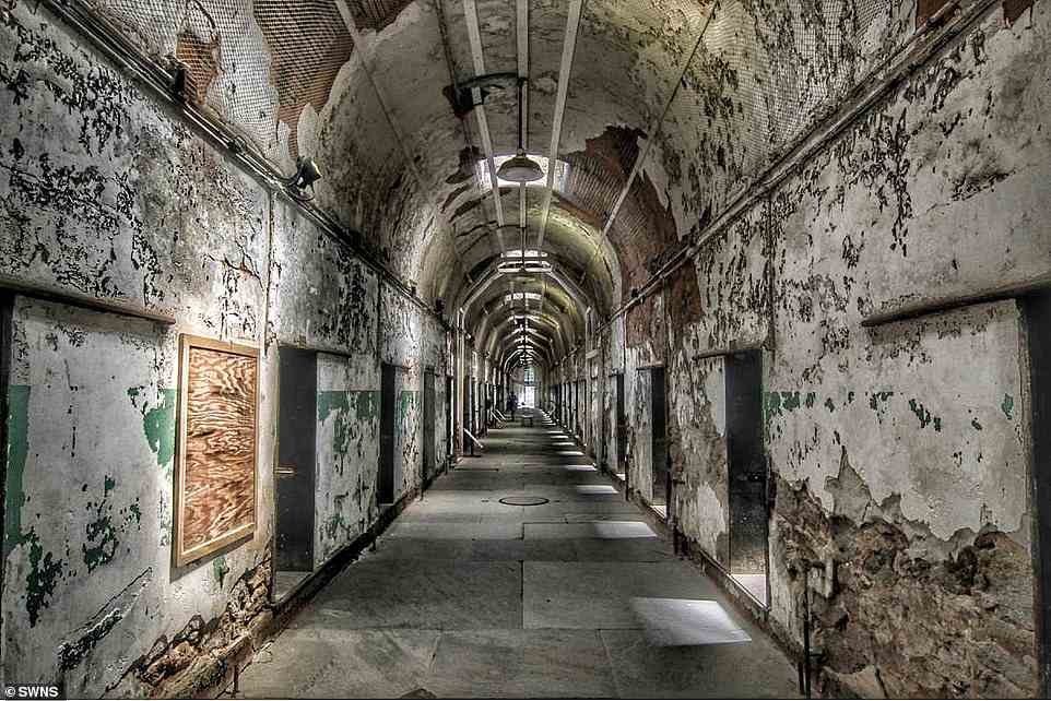 The crumbling stone walls, dark corridors and claustrophobia-inducing cells that once housed thousands of dangerous criminals are lade bare in a series of photographs taken by an urban explorer