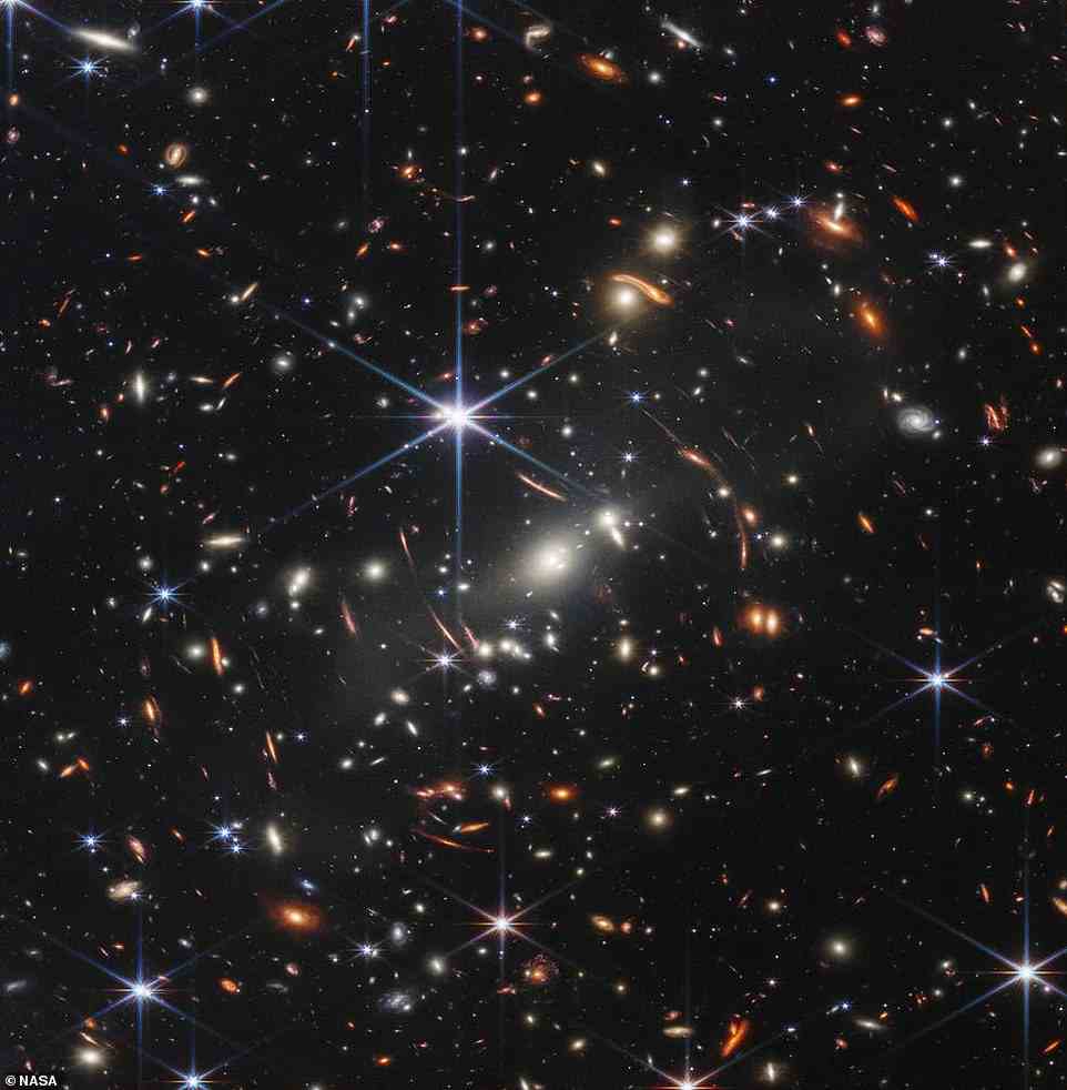 'We¿re looking back more than 13 billion years,' said NASA's Bill Nelson. Pictured is the first image from the James Webb Space Telescope, showing SMACS 0723, a galaxy cluster billions of light-years from Earth