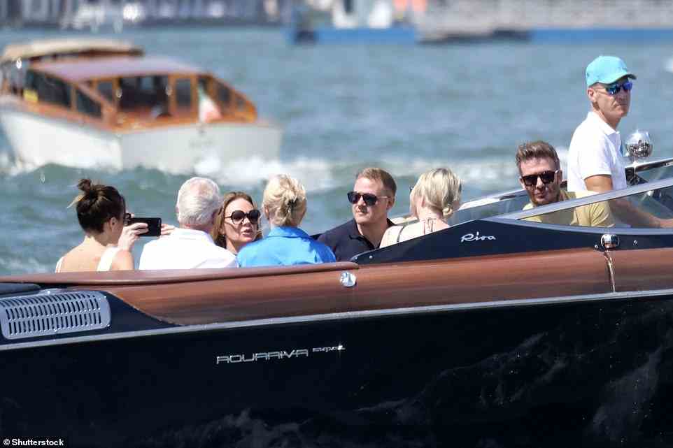 A family affair! Victoria and David Beckham were joined by her family in Venice, after the couple travelled to the Italian city on the Orient Express on Tuesday