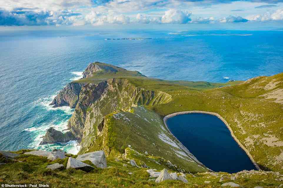 Pictured is the spectacular Bunnafreva lake on the western side of Achill Island, which is joined to the mainland of County Mayo via the Micheal Davitt Bridge, built in 2008. The isle - which is Ireland's largest - has a history of human settlement that dates back around 5,000 years, with Megalithic tombs and promontory forts to be explored. Today, as well as a population of around 2,500, the isle is home to an array of wildlife including rare birds such as the chough, golden plover, and merlin falcon, says the official tourism website. Other residents of note include the German writer and winner of the Nobel Prize for Literature Heinrich Boll, who once had a cottage on Achill Island. His literary retreat, found on the outskirts of Dugort village on the northern side of the isle, now invites artists and writers to apply for a two-week residency ¿to concentrate fully on their work¿ and use Achill as a ¿source of inspiration¿, says heinrichboellcottage.com. For visitors looking for their own inspiration, Achill Island is around a two-hour, 20-minute drive from Galway City