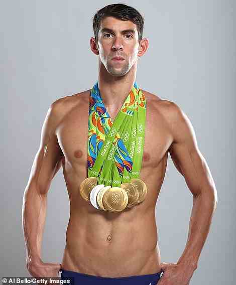 Micheal Phelps, former competitive swimmer and the most decorated Olympian of all time, is 6'4" (1.93 m) and has a two-metre arm span
