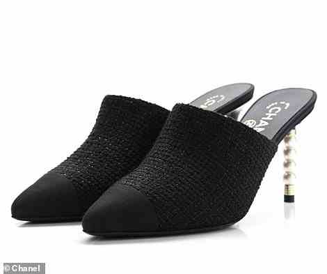 On her feet, she opted for black Chanel Pearl heels. The shoes are no longer available for purchase, but a similar pair from the company costs $1,350