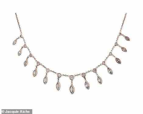 She sported a $17,000 diamond teardrop necklace (pictured)