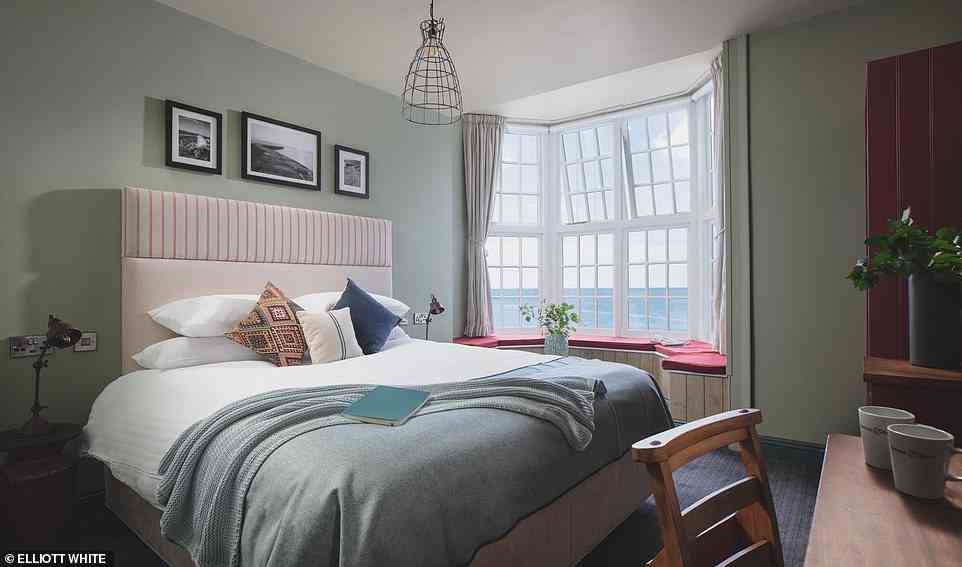 Stay in a Pub notes that the property has nine 'stylish' bedrooms with 'panoramic coastal views' that are arranged as deluxe king doubles and king/twin rooms