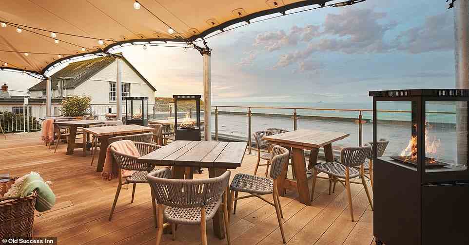 One of the inn's highlights is its large outdoor terrace, which has a covering and outdoor heaters for the cooler months