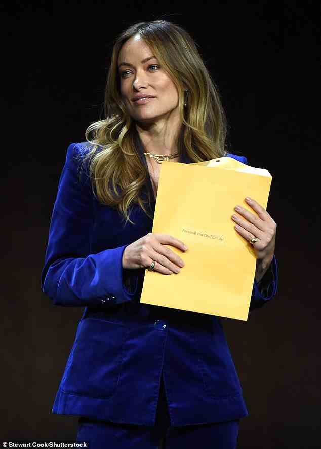 The Hollywood star was in the middle of a presentation for 4,100 film industry executives about her upcoming thriller Don't Worry Darling when she was awkwardly handed a manila envelope by a court process server