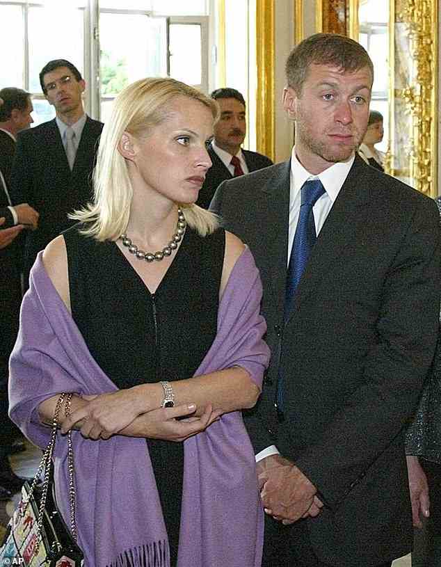 Irina Malandina wed Russian billionaire and the former owner of Chelsea FC Roman Abramovich (pictured together in 2003) in 1991 after the pair met on an Aeroflot flight to Germany, before splitting up in 2007