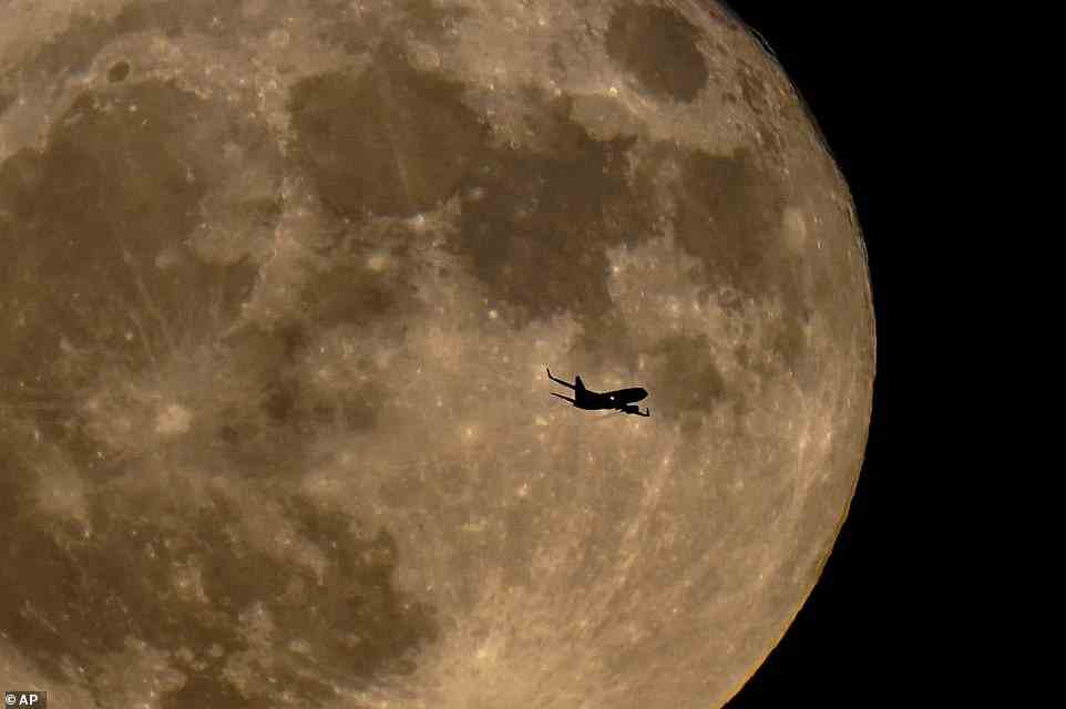 A supermoon occurs when a full moon nearly coincides with perigee – the point in the orbit of the moon at which it is nearest to the Earth. Pictured is last month's supermoon, on July 13