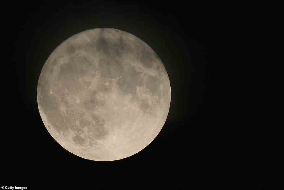 A supermoon occurs when a full moon nearly coincides with perigee ¿ the point in the orbit of the moon at which it is nearest to the Earth. It's pictured here as seen from Melville, New York last night