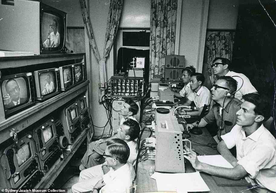 Journalists covering Eichmann's trial are pictured in the TV control room in Jerusalem. The hearings were televised and reported daily in newspapers