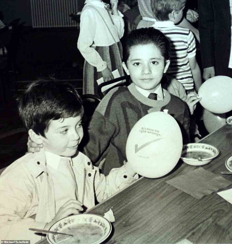 Acclaimed singer/songwriter Darius Danesh (ppictured right) at age 10 with his brother Aria (left) at a party in Bearsden South Church, Glasgow