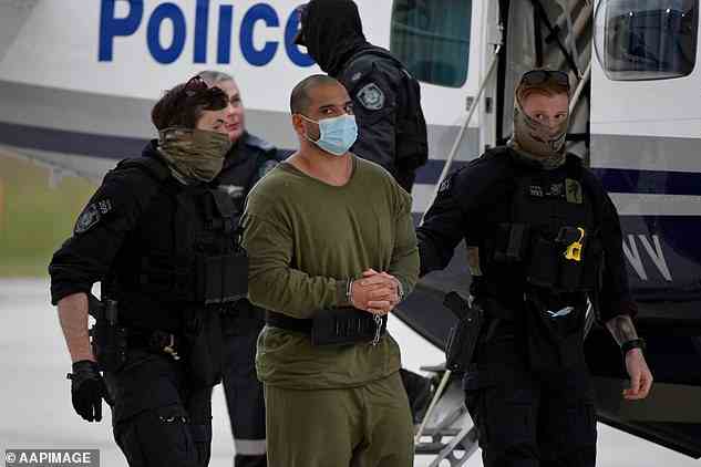 Baluch - dubbed 'Australia's Pablo Escobar' - was captured by police after he was found inside a shipping container inside a truck on the NSW-Queensland border (pictured at Bankstown Airport after extradition)