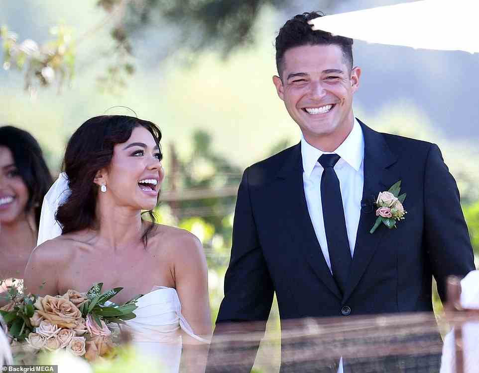 The couple, who got engaged in July of 2019 while on a Fiji getaway, beamed on their wedding day