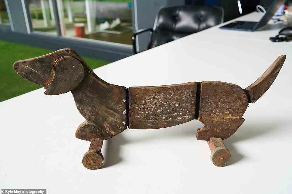 A handmade wooden 'sausage dog' was also found on the submarine. It could have been a gift intended for a family member of one of the crew