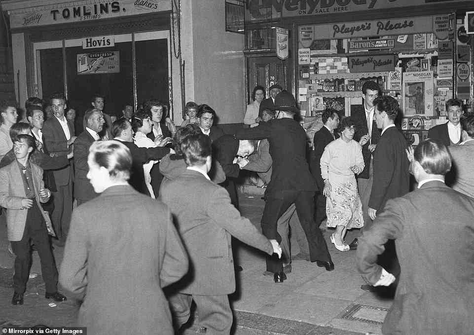 Scenes in and around Bramley Road in Notting Hill, where police were called to prevent trouble between black and white residents in the area during the race riots in 1958