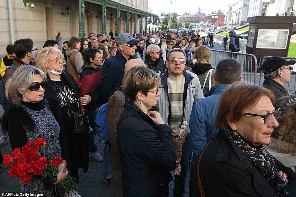 People stand in line to attend a farewell ceremony in front of the building of the Hall of Columns, where a farewell ceremony for the last leader of the Soviet Union and winner of the Nobel Peace Prize in 1990, Gorbachev is taking place in Moscow