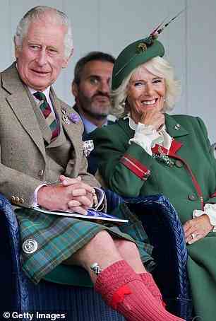 Camilla (right) was snapped laughing, suggesting the couple had shared a joke