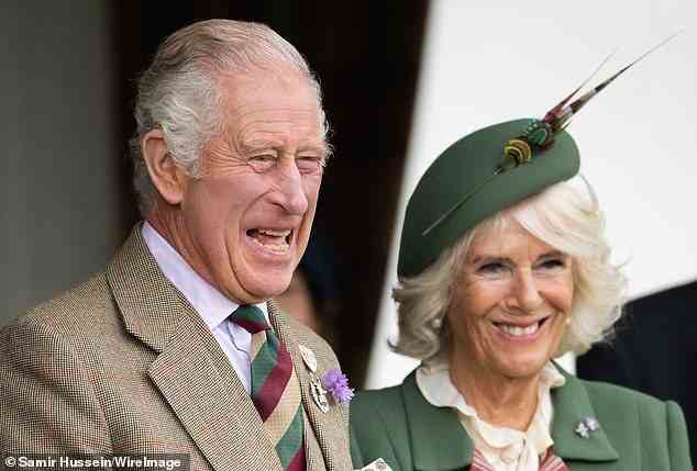 Fun and games: Prince Charles (left) seemed to be in high spirits at some points during the traditional event (pictured with Camilla, right)