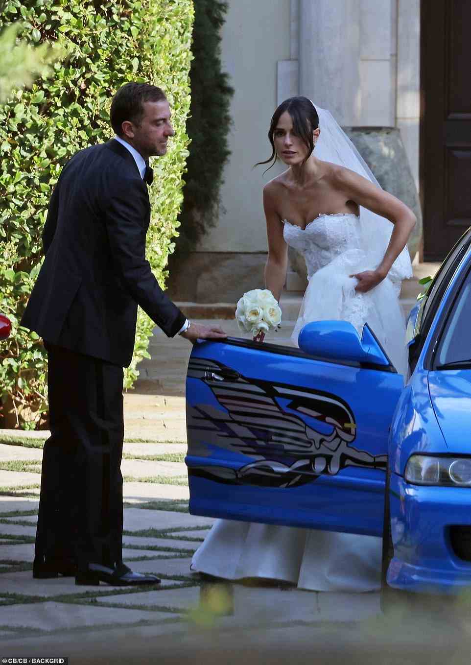 Iconic car: The bride got into a blue featured in many of the Fast & Furious films