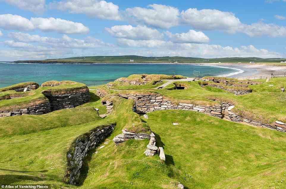 Pictured is the Neolithic settlement of Skara Brae on Orkney. Elborough warns: 'The weather poses an ever-present danger to Skara Brae. Rising sea levels and increasingly violent storms connected to climate change could now wipe it away just as swiftly as the winds that unearthed it'