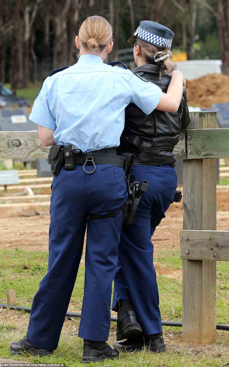 Colleagues unable to attend the funeral later paid their respects at Narellan  Cemetery where they watched his burial