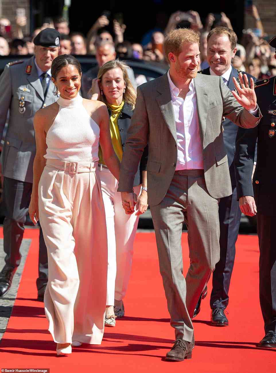 Prince Harry, Duke of Sussex and Meghan, Duchess of Sussex on the red carpet during the Invictus Games Dusseldorf 2023 - One Year To Go launch event