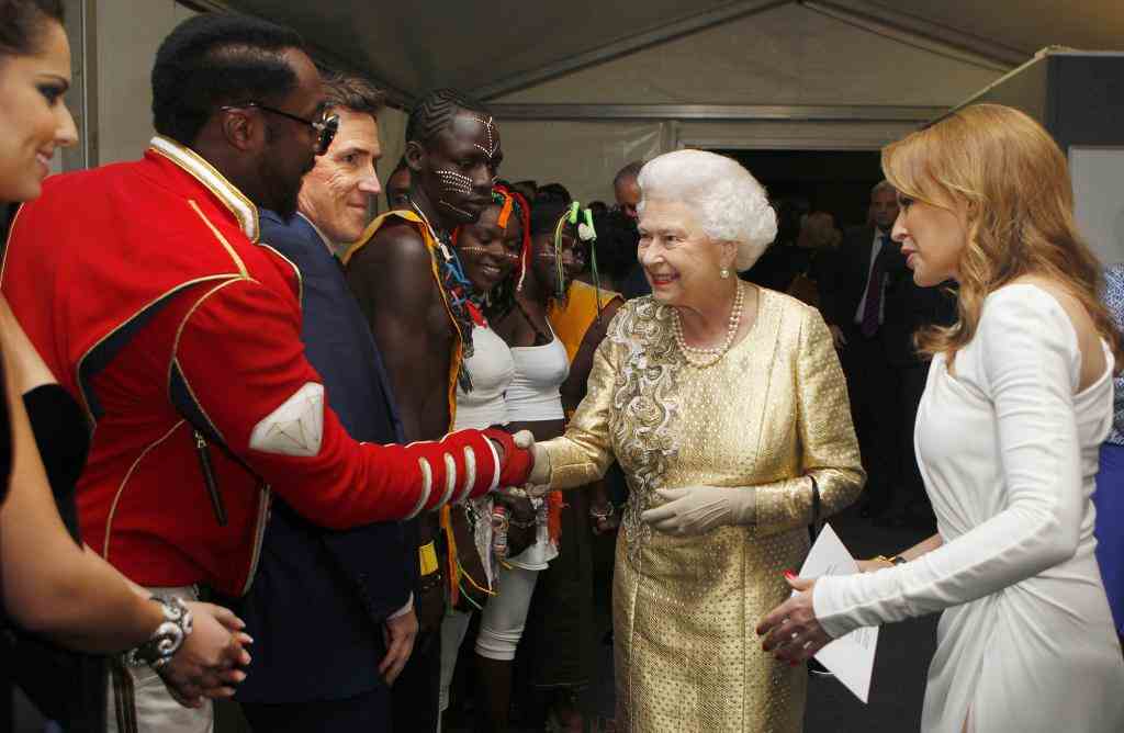 Queen Elizabeth II greets US singer-song