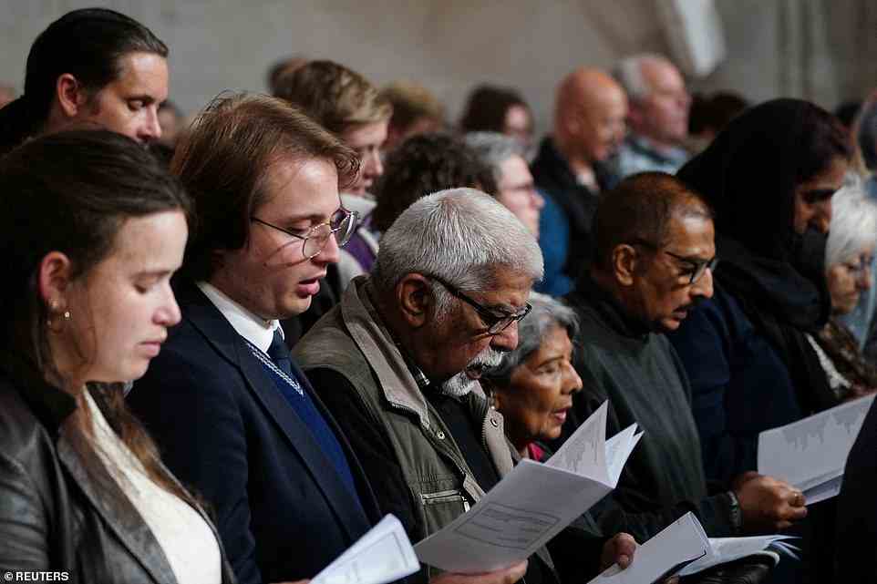 Members of the congregation attend the Service of Prayer and Reflection at St Paul's Cathedral