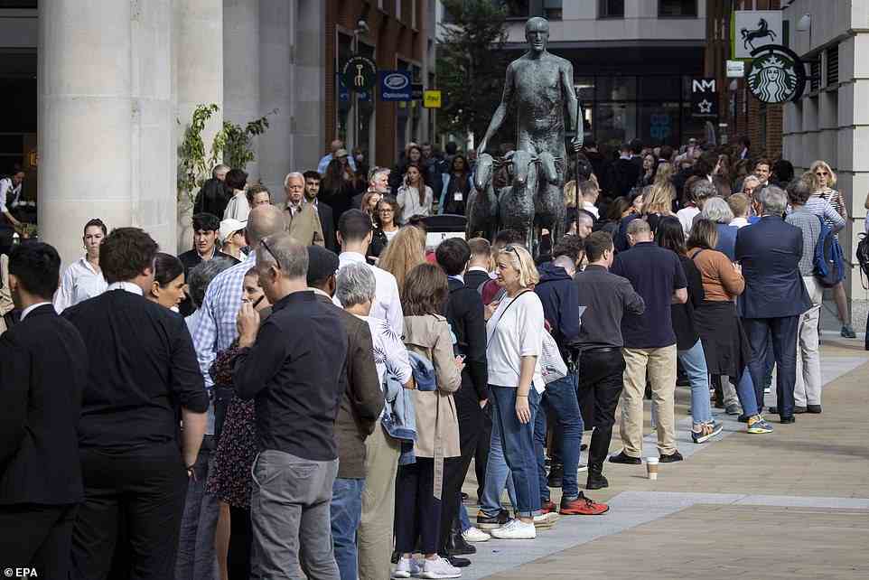 People queue to join a Service of Prayer and Reflection for Britain's late Queen Elizabeth II