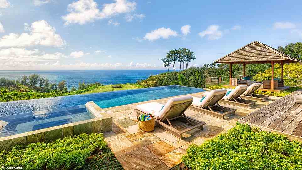 At Secret Cove, a villa on the Hawaiian island of Kauai, there's an infinity pool that sits high above a hidden beach with a private path down to the sand