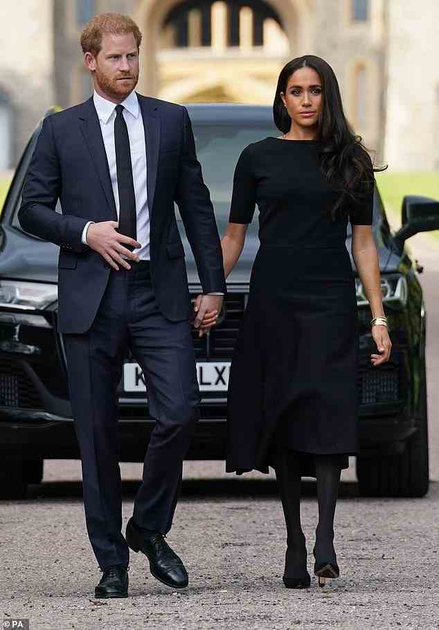 The US-based Duke and Duchess of Sussex (pictured in Windsor on Saturday) have reportedly confirmed they will be staying in Britain until the end of the royal mourning period, which finishes seven days after the service on September 19