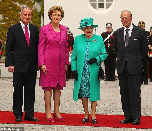 Queen Elizabeth II (2nd R) and Prince Philip, Duke of Edinburgh (R) pictured with Irish President Mary McAleese (2nd L) and her husband Martin McAleese (L) as they arrived at the Aras an Uachtarain, the official residence of the President of Ireland, on May 17, 2011 in Dublin, Ireland